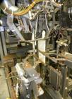 Used Taylor Products TOMP Open Mouth Bag Hanger with APO Bulk Bag Filling Line. Machine is capable of speeds up to 15 bags per minute. Can run paper or poly bags with 300 count magazine. Has a model ...