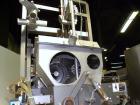 Used Taylor Products TOMP Open Mouth Bag Hanger with APO Bulk Bag Filling Line. Machine is capable of speeds up to 15 bags per minute. Can run paper or poly bags with 300 count magazine. Has a model ...