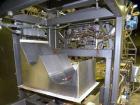 Used Taylor Products TOMP Open Mouth Bag Hanger with APO Bulk Bag Filling Line. Machine is capable of speeds up to 15 bags per minute. Can run paper or poly bags with 300 count magazine. Has a model ...