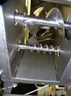 Used Taylor Products TOMP Open Mouth Bag Hanger with APO Bulk Bag Filling Line. Machine is capable of speeds up to 15 bags per minute. Can run paper or poly bags with 300 count magazine. Has a model ...