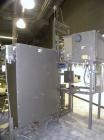 Used Taylor Products TOMP Open Mouth Bag Hanger with APO Bulk Bag Filling Line. Machine is capable of speeds up to 15 bags per minute. Can run paper or poly bags with 300 count magazine. Has a model ...