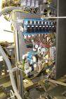 Used Taylor Products TOMP Open Mouth Bag Hanger with APO Bulk Bag Filling Line. Machine is capable of speeds up to 15 bags per minute. Can run paper or poly bags with 300 count magazine. Has a model ...