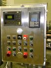 Used Taylor Products TOMP Open Mouth Bag Hanger with APO Bulk Bag Filling Line. Machine is capable of speeds up to 15 bags per minute. Can run paper or poly bags with 300 count magazine. Has a model ...