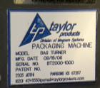 Used Taylor Products TOMP Open Mouth Bag Hanger with APO Bulk Bag Filling Line. Machine is capable of speeds up to 15 bags per minute. Can run paper or poly bags with 300 count magazine. Has a model ...