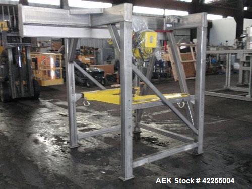Used Flexicon Bulk Bag Unloading Station, model BFC, stainless steel. Yale electric hoist, model MDT01, 2000# capacity, .25 hp, 230/460 volt hoist motor, approximately 221" overall height.