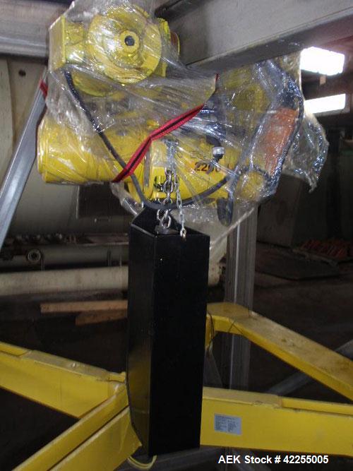 Used Flexicon Bulk Bag Unloading Station, model BFC, stainless steel. Yale electric hoist, model MDT02, 2000# capacity, .25 hp, 230/460 volt hoist motor, pneumatic bottom bag tappers, TELE-TUBE teles...