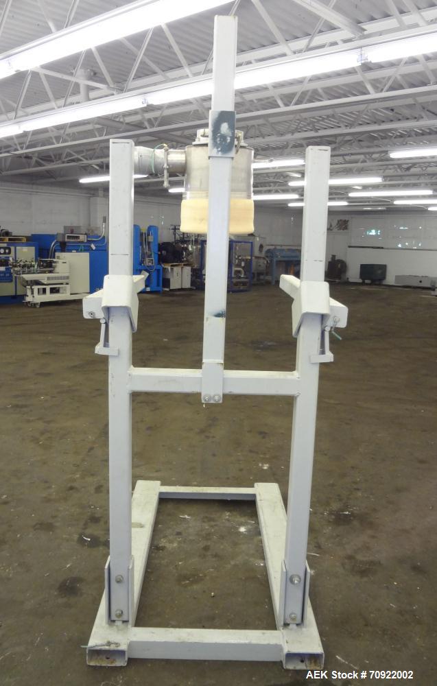 Used FormPak Manual Bag Pak Spout Top Bulk Bag Filler.  For  filling of spout top Super Sacks weighing up to 4000 lbs. An air expanded bladder seals the bag spout to the filler during the fill cycle....