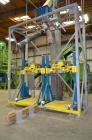 Used Flexicon Bulk Bag Filling System Consisting Of: (2) Twin-Centerpost Bulk Bag Fillers, carbon steel. Manual fill head height adjustment, pneumatically retractable bag hooks, inflatable connector ...