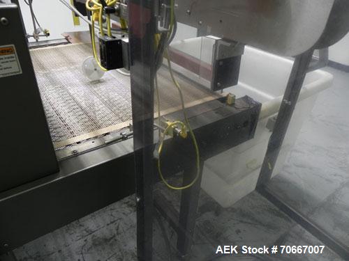 Used MG2 encapsulator, model FUTURA, multiple sets of change parts with controls, rated up to 40,000 capsules/hr, serial # 5236, built 1998, NOTE: PRICE INCLUDES A 15% BUYERS PREMIUM.