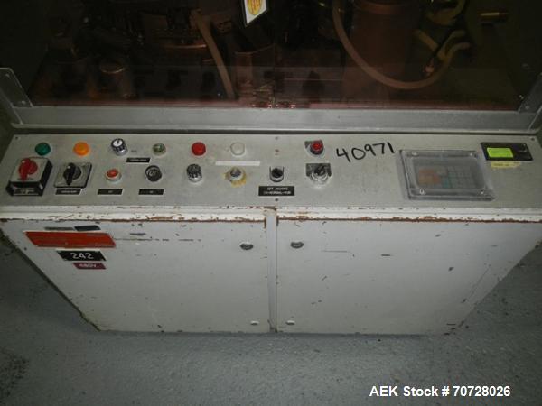 Used Bosch encapsulator, model GKF1500, presently set up with size 0 change parts, serial# 640253, 1982.