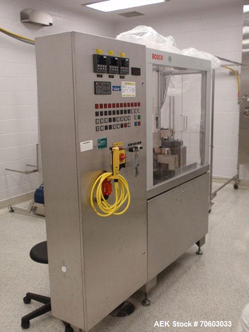 Used Bosch Encapsulator, Model GKF800. Rated up to 800 capsules per minute, with tooling for capsule liquid filling, serial# 773360MS2002W, new 1995.