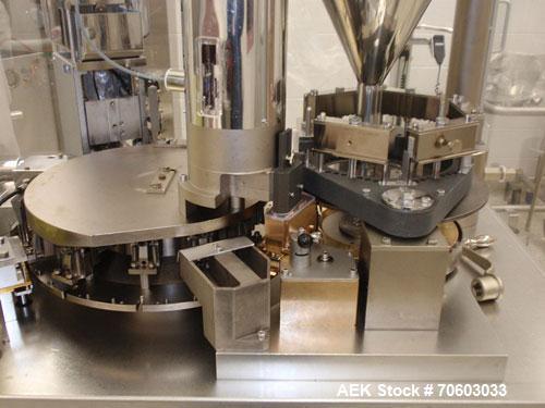 Used Bosch Encapsulator, Model GKF800. Rated up to 800 capsules per minute, with tooling for capsule liquid filling, serial# 773360MS2002W, new 1995.