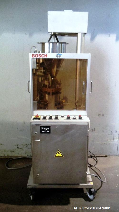 Used Bosch Automatic Capsule Filler, Model GKF-120. Rated up to 120 capsules per minute. Includes size, 0, 1, and 3 change parts.