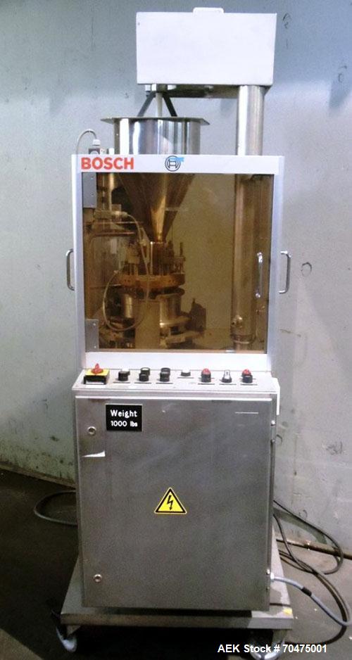 Used Bosch Automatic Capsule Filler, Model GKF-120. Rated up to 120 capsules per minute. Includes size, 0, 1, and 3 change parts.