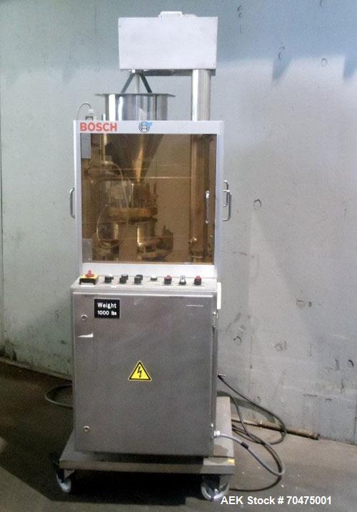 Used Bosch Automatic Capsule Filler, Model GKF-120. Rated up to 120 capsules per minute. Includes size, 0, 1, and 3 change parts.