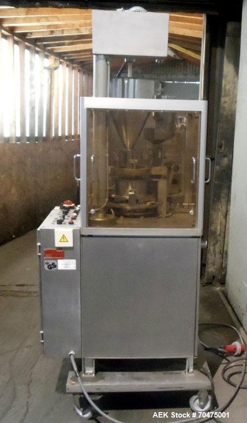 Used Bosch Automatic Capsule Filler, Model GKF-120. Rated up to 120 capsules per minute. Includes size, 0, 1, and 3 change parts.