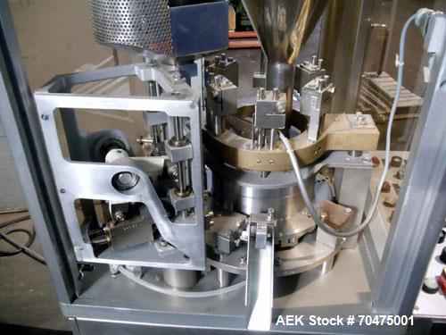 Used Bosch Automatic Capsule Filler, Model GKF-120. Rated up to 120 capsules per minute. Includes size, 0, 1, and 3 change parts.