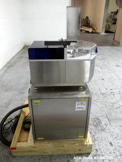 Used Capsugel Xcelodose Capsule Filler, Model XD600. With cabinet and 00, 0, 1, 2, 3, 4 change parts, serial# 600-1-040.