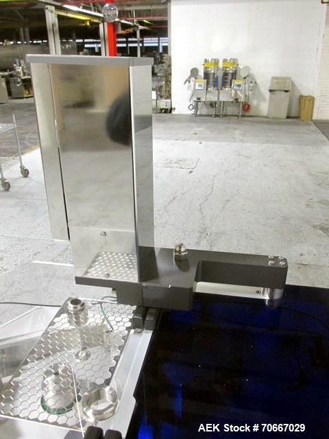 Used Capsugel Xcelodose Capsule Filler, Model XD600. With cabinet and 00, 0, 1, 2, 3, 4 change parts, serial# 600-1-040.