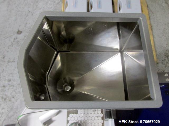 Used Capsugel Xcelodose Capsule Filler, Model XD600. With cabinet and 00, 0, 1, 2, 3, 4 change parts, serial# 600-1-040.