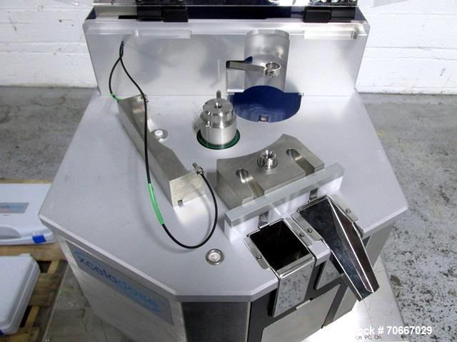 Used Capsugel Xcelodose Capsule Filler, Model XD600. With cabinet and 00, 0, 1, 2, 3, 4 change parts, serial# 600-1-040.