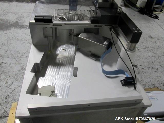 Used Capsugel Xcelodose Capsule Filler, Model XD600. With cabinet and 00, 0, 1, 2, 3, 4 change parts, serial# 600-1-040.