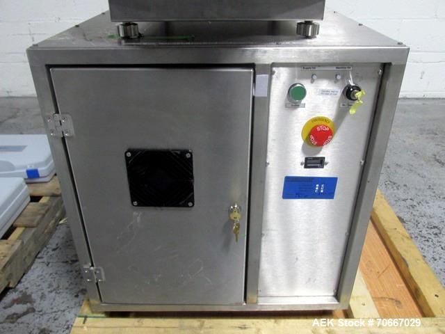 Used Capsugel Xcelodose Capsule Filler, Model XD600. With cabinet and 00, 0, 1, 2, 3, 4 change parts, serial# 600-1-040.