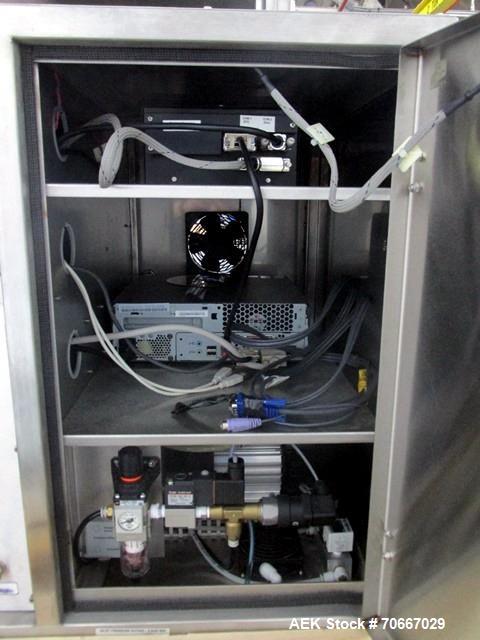 Used Capsugel Xcelodose Capsule Filler, Model XD600. With cabinet and 00, 0, 1, 2, 3, 4 change parts, serial# 600-1-040.