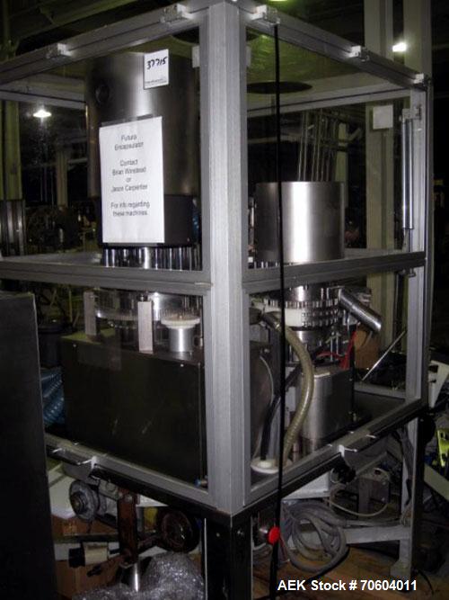 Used MG2 Futura rotary capsule filler, rated up to 48,000 capsules/hour, change parts for 0,1 and 3 capsules, with dust collection and controls, 480 volt, serial# 5161/5019. PRICE INCLUDES A 15% BUYE...