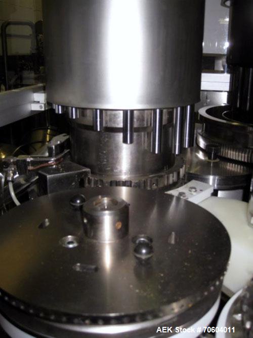 Used MG2 Futura rotary capsule filler, rated up to 48,000 capsules/hour, change parts for 0,1 and 3 capsules, with dust collection and controls, 480 volt, serial# 5161/5019. PRICE INCLUDES A 15% BUYE...