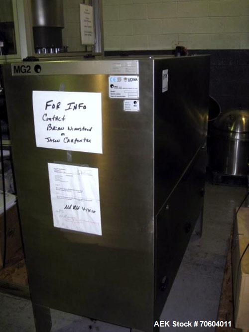 Used MG2 Futura rotary capsule filler, rated up to 48,000 capsules/hour, change parts for 0,1 and 3 capsules, with dust collection and controls, 480 volt, serial# 5161/5019. PRICE INCLUDES A 15% BUYE...