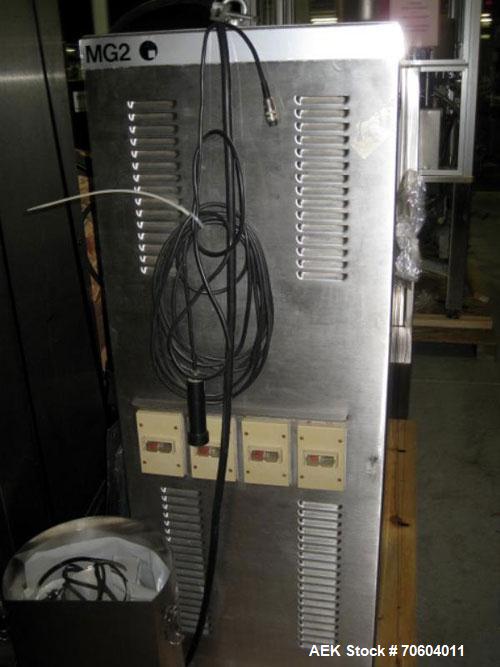 Used MG2 Futura rotary capsule filler, rated up to 48,000 capsules/hour, change parts for 0,1 and 3 capsules, with dust collection and controls, 480 volt, serial# 5161/5019. PRICE INCLUDES A 15% BUYE...