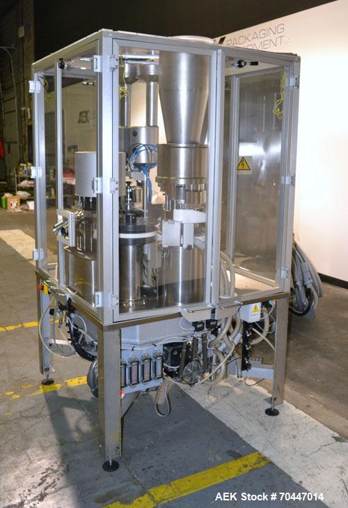 Used MG2 Futura automatic capsule filler capable of speeds up to 48,000 capsules per hour. Can run capsule sizes from 000 to 5, including tamper evident with proper changeparts. Currently haas change...