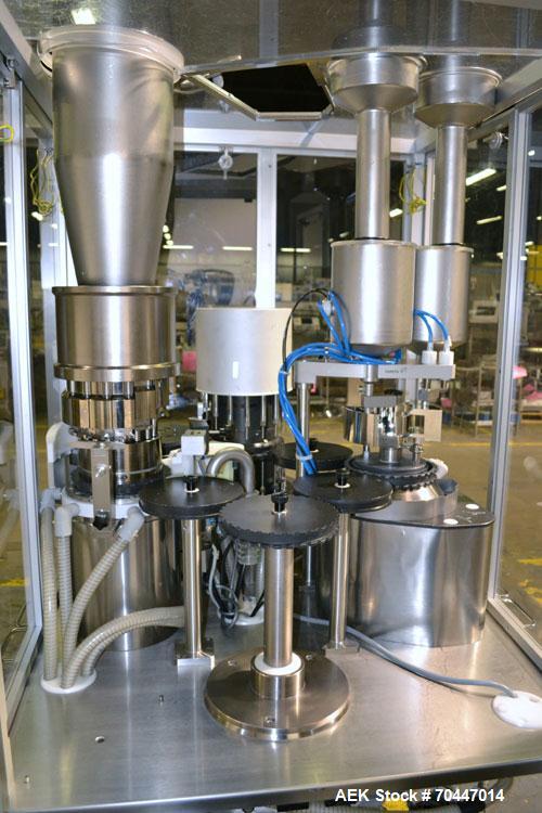 Used MG2 Futura automatic capsule filler capable of speeds up to 48,000 capsules per hour. Can run capsule sizes from 000 to 5, including tamper evident with proper changeparts. Currently haas change...