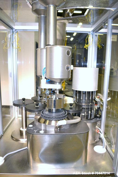 Used MG2 Futura automatic capsule filler capable of speeds up to 48,000 capsules per hour. Can run capsule sizes from 000 to 5, including tamper evident with proper changeparts. Currently haas change...
