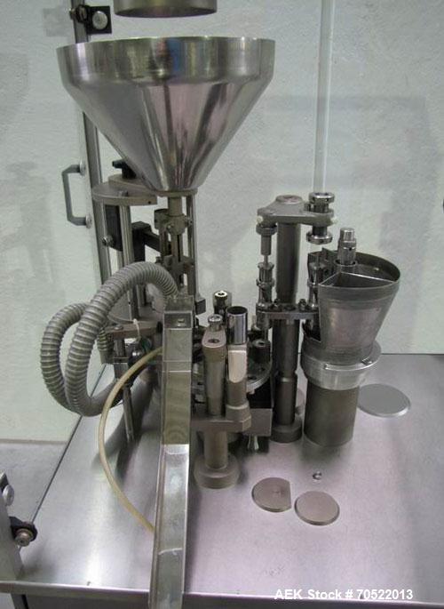 Used Zanasi AZ5 Capsule Filling/Closing Machine.  Maximum output 4,200 capsules/hour, 3/380V/60 hz, for capsule sizes 000 - 5, integrated vacuum pump and vacuum cleaner, format sets for sizes 0 / 2.