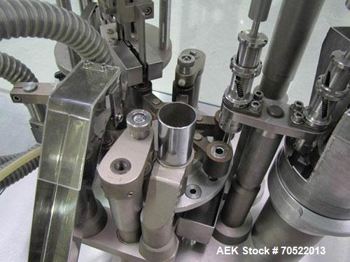 Used Zanasi AZ5 Capsule Filling/Closing Machine.  Maximum output 4,200 capsules/hour, 3/380V/60 hz, for capsule sizes 000 - 5, integrated vacuum pump and vacuum cleaner, format sets for sizes 0 / 2.