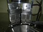 Used Bosch encapsulator, model GKF1500, presently set up with size 3 change parts, serial# 640242, 1982.