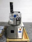 Used Capsugel Xcelodose Capsule Filler, Model XD600. With cabinet and 00, 0, 1, 2, 3, 4 change parts, serial# 600-1-040.
