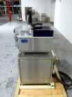 Used Capsugel Xcelodose Capsule Filler, Model XD600. With cabinet and 00, 0, 1, 2, 3, 4 change parts, serial# 600-1-040.