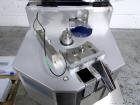 Used Capsugel Xcelodose Capsule Filler, Model XD600. With cabinet and 00, 0, 1, 2, 3, 4 change parts, serial# 600-1-040.