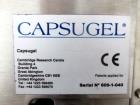 Used Capsugel Xcelodose Capsule Filler, Model XD600. With cabinet and 00, 0, 1, 2, 3, 4 change parts, serial# 600-1-040.