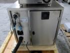 Used Capsugel Xcelodose Capsule Filler, Model XD600. With cabinet and 00, 0, 1, 2, 3, 4 change parts, serial# 600-1-040.