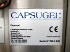 Used Capsugel Xcelodose Capsule Filler, Model XD600. With cabinet and 00, 0, 1, 2, 3, 4 change parts, serial# 600-1-040.