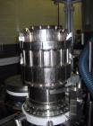 Used MG2 Futura rotary capsule filler, rated up to 48,000 capsules/hour, change parts for 0,1 and 3 capsules, with dust collection and controls, 480 volt, serial# 5161/5019. PRICE INCLUDES A 15% BUYE...