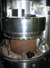 Used MG2 Futura rotary capsule filler, rated up to 48,000 capsules/hour, change parts for 0,1 and 3 capsules, with dust collection and controls, 480 volt, serial# 5161/5019. PRICE INCLUDES A 15% BUYE...