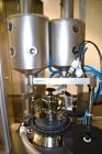 Used MG2 Futura automatic capsule filler capable of speeds up to 48,000 capsules per hour. Can run capsule sizes from 000 to 5, including tamper evident with proper changeparts. Currently haas change...