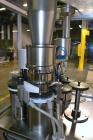 Used MG2 Futura automatic capsule filler capable of speeds up to 48,000 capsules per hour. Can run capsule sizes from 000 to 5, including tamper evident with proper changeparts. Currently haas change...