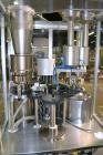 Used MG2 Futura automatic capsule filler capable of speeds up to 48,000 capsules per hour. Can run capsule sizes from 000 to 5, including tamper evident with proper changeparts. Currently haas change...