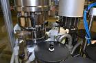 Used MG2 Futura automatic capsule filler capable of speeds up to 48,000 capsules per hour. Can run capsule sizes from 000 to 5, including tamper evident with proper changeparts. Currently haas change...